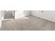 Carpeted bedroom with bright natural light and neutral color palette at 21134 E 63Rd Dr, Aurora, CO 80019