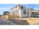 Well-maintained home with a fenced yard, offering privacy and outdoor enjoyment at 21134 E 63Rd Dr, Aurora, CO 80019
