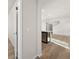 Modern kitchen with wood flooring and stainless steel dishwasher on the island at 21134 E 63Rd Dr, Aurora, CO 80019