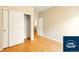 Bedroom with wood floors and a closet at 5720 S Tempe Ct, Aurora, CO 80015