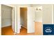 Hallway with access to bedroom, bathroom, and closet at 5720 S Tempe Ct, Aurora, CO 80015