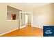 Living room with hardwood floors and a view into other areas of the home at 5720 S Tempe Ct, Aurora, CO 80015
