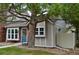 Attractive home showcasing a brick exterior, beautiful landscaping, and a cozy front entrance at 9713 W Chatfield Ave # H, Littleton, CO 80128