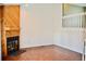 Inviting living room showcasing a fireplace and ample space, perfect for entertaining and relaxation at 9713 W Chatfield Ave # H, Littleton, CO 80128