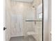 Modern shower with decorative tiling and glass enclosure at 2520 E 127Th Ave, Thornton, CO 80241