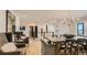 Dining room with modern chandelier, hardwood floors, and decor accents at 2231 Meadow Green Cir, Franktown, CO 80116