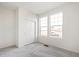 Clean bedroom featuring neutral carpet, base trim, closet, and natural light at 13412 E 110Th Way, Commerce City, CO 80022