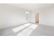 Bright bedroom featuring neutral carpet, base trim, and natural light at 13412 E 110Th Way, Commerce City, CO 80022