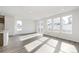 Bright living room area featuring light wood floors and lots of natural light at 13412 E 110Th Way, Commerce City, CO 80022
