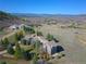 Panoramic aerial view showcasing a home with mountain views and a sprawling landscape at 4749 Starfire Cir, Castle Rock, CO 80104