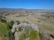 Stunning home with mountain views, a sprawling lawn and mature trees at 4749 Starfire Cir, Castle Rock, CO 80104