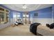 Charming bedroom featuring a cozy teepee and playful decor by the expansive window at 4749 Starfire Cir, Castle Rock, CO 80104