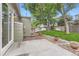 The property shows a well-maintained backyard with a concrete patio and rock landscaping at 9705 Autumnwood Pl, Highlands Ranch, CO 80129