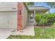 A cozy home with a well-kept lawn and red brick accents at 9705 Autumnwood Pl, Highlands Ranch, CO 80129