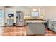 Modern kitchen featuring stainless steel appliances and a kitchen island at 9705 Autumnwood Pl, Highlands Ranch, CO 80129