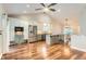 Open kitchen featuring stainless steel appliances, island, and updated cabinetry at 9705 Autumnwood Pl, Highlands Ranch, CO 80129