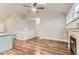 Neutral interior with fireplace, hardwood floors, and natural light at 9705 Autumnwood Pl, Highlands Ranch, CO 80129