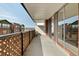 A lengthy balcony with a concrete floor and view of the mountains at 4570 E Yale Ave # 507, Denver, CO 80222