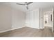 A spacious bedroom with laminate flooring, a ceiling fan, and closet at 4570 E Yale Ave # 507, Denver, CO 80222