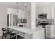 Spacious kitchen with an island and stainless steel appliances with ample countertop space at 4570 E Yale Ave # 507, Denver, CO 80222