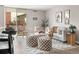 Beautifully staged living room with a modern design, natural light, and inviting seating arrangements at 4570 E Yale Ave # 507, Denver, CO 80222
