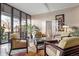 Comfortable lobby area with seating, plants, and decorative room divider at 4570 E Yale Ave # 507, Denver, CO 80222