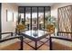 Inviting sitting area with modern furniture, large windows, and beautiful decor offers a relaxing space at 4570 E Yale Ave # 507, Denver, CO 80222
