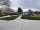 Neighborhood playground with play structure, picnic tables, and green space at 1605 Longbow Ct, Lafayette, CO 80026