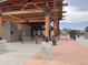 Waterpark entrance with pergola, fence, and aquatic themed decor at 1605 Longbow Ct, Lafayette, CO 80026