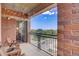 Inviting balcony with outdoor seating and views of the surrounding landscape at 1975 Grant St # 501, Denver, CO 80203