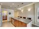 Spacious kitchen island with granite countertop, stainless steel dishwasher and pendant lighting at 1975 Grant St # 501, Denver, CO 80203