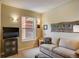 Comfortable living room featuring a neutral-toned sofa, window view, and decorative accents at 1975 Grant St # 501, Denver, CO 80203