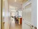 Hallway view of the open-concept kitchen and living space, highlighting a modern design and inviting atmosphere at 1975 Grant St # 501, Denver, CO 80203