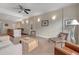 Spacious living area showing the kitchen, bar, and living room with neutral colors and modern decor at 1975 Grant St # 501, Denver, CO 80203