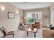 Inviting living room filled with natural light, featuring modern decor and comfortable seating arrangements at 1975 Grant St # 501, Denver, CO 80203