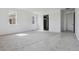 Spacious bedroom with plush carpeting, white walls, and a doorway leading to other rooms at 25224 E Warren Pl, Aurora, CO 80018