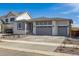 Charming single-story home with a spacious three-car garage and well-maintained landscaping at 25224 E Warren Pl, Aurora, CO 80018