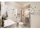 Updated bathroom with walk-in shower and modern vanity at 9335 E Center Ave # 4B, Denver, CO 80247