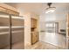 Kitchen features stainless steel appliances and wood cabinets at 9335 E Center Ave # 4B, Denver, CO 80247