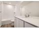 Contemporary bathroom featuring quartz countertops and a shower and tub combo at 15276 Fillmore St, Thornton, CO 80602