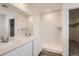 Clean bathroom with a double vanity and a glass-enclosed shower at 15276 Fillmore St, Thornton, CO 80602