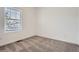 Carpeted bedroom with a window at 15276 Fillmore St, Thornton, CO 80602