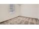Carpeted bedroom with a window at 15276 Fillmore St, Thornton, CO 80602