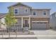 Charming two-story home featuring stone accents and a covered front porch at 15276 Fillmore St, Thornton, CO 80602