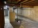 Unfinished basement with exposed beams and mechanical equipment at 1967 S Oakland Way, Aurora, CO 80014