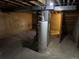 Utility area in the basement with water heater and exposed ceiling at 1967 S Oakland Way, Aurora, CO 80014