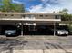 Carport parking with covered parking spots in front of the townhome at 1967 S Oakland Way, Aurora, CO 80014