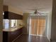 Compact dining area with kitchen bar and large windows at 1967 S Oakland Way, Aurora, CO 80014