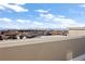 Scenic rooftop view of the city skyline and Rocky Mountains on a clear day at 6971 E Lowry Blvd, Denver, CO 80230