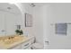 Bathroom with updated vanity, artwork, and fixtures at 1590 S Macon St, Aurora, CO 80012